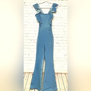 Denim Jumpsuit With Ruffle Shoulders, Criss Cross Open Back | Flare Leg | Size S